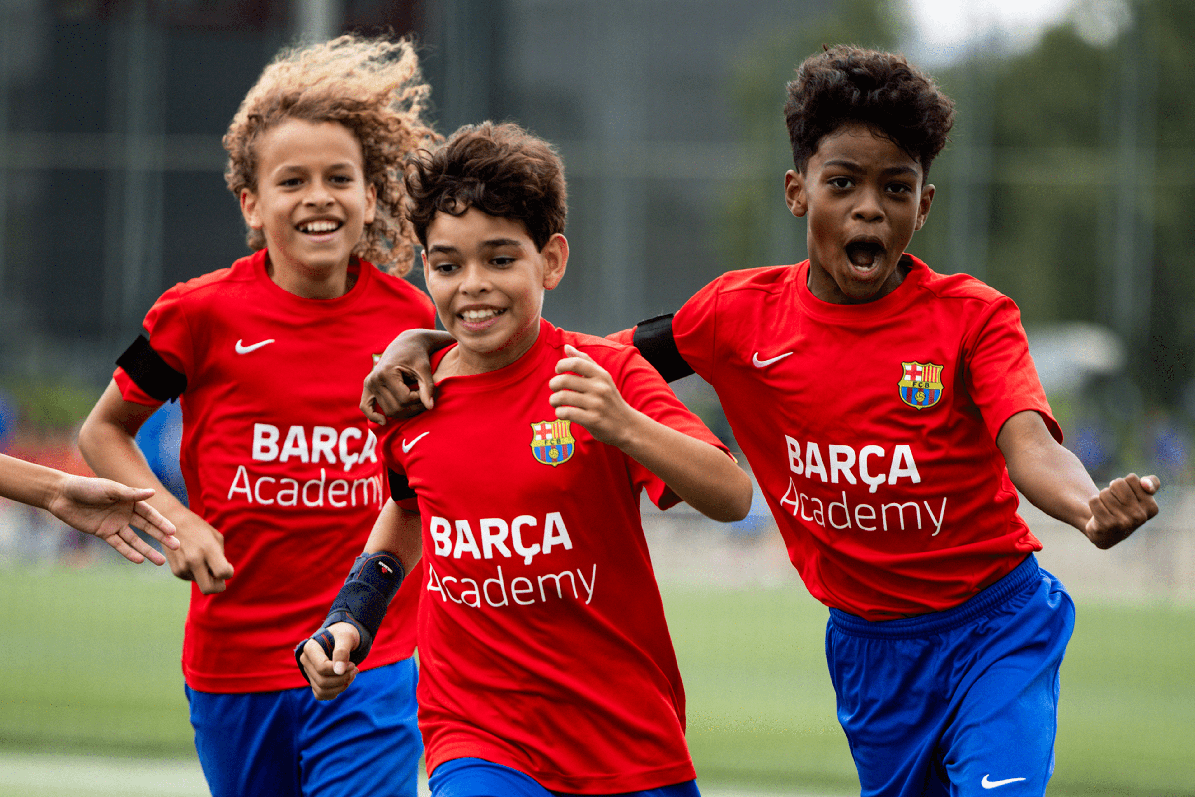 Joueurs de la Barça Academy à l'entraînement avec leur entraîneur